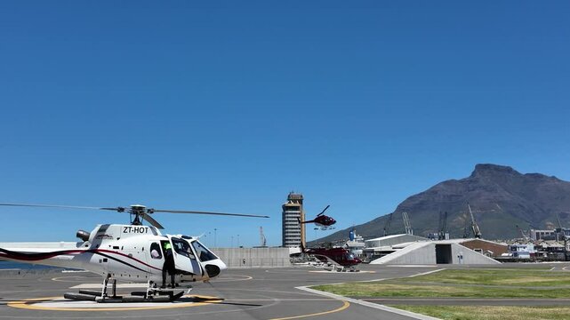 Cape Town South Africa, 07.01.2025, Video. Helicopter activity on the waterfront helipad in Cape Town South Africa.