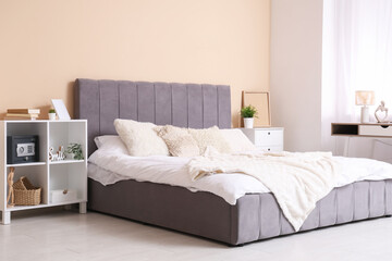 Interior of bedroom with safe on shelf