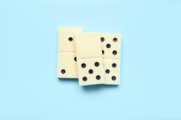 White dominos blocks on blue background