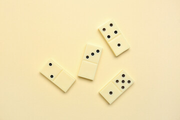 White dominos blocks on beige background