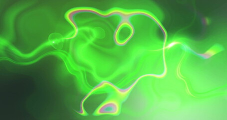 Image of glowing light trails moving over green and black background