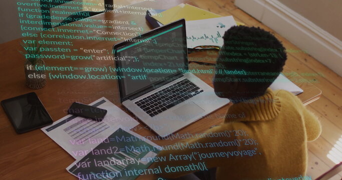 Image of data processing over african american woman using laptop working from home - Powered by Adobe