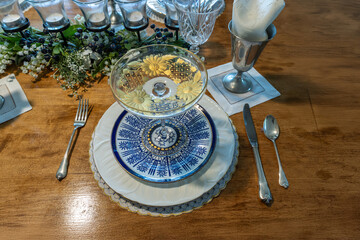 Fine China plates and a golden compote dish