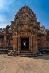 Naklejka premium Lintel of the main castle, made of sandstone, carved with images in an ancient site, Ancient architecture Sand Stone Castle in Buriram province, Thailand, Prasat Muang Tam Khmere architectural site.