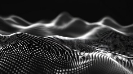 Abstract grayscale wave of glowing particles on black background.