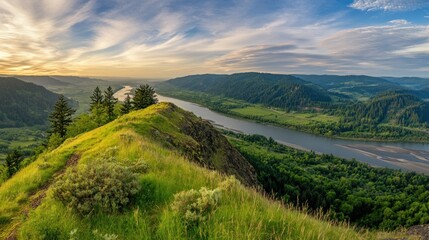 Fototapeta premium Majestic River Valley View from Hilltop at Sunset with Dramatic Clouds
