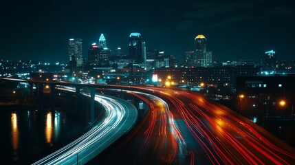 Fototapeta premium 22.A stunning urban landscape of downtown Cincinnati at night, with the cityâ€™s skyline towering over the scene. The skyscrapers are illuminated with bright lights, casting vibrant reflections on the