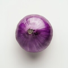 Single red onion overhead on white background.