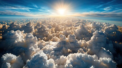 Naklejka premium A breathtaking view of fluffy clouds illuminated by a radiant sun in a blue sky.