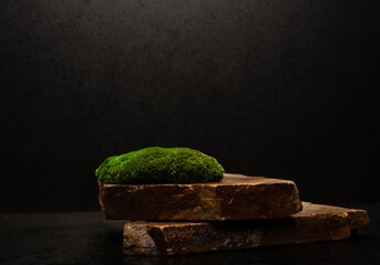 cosmetic beauty podium background with brown stones.natural stones with texture on dark background...
