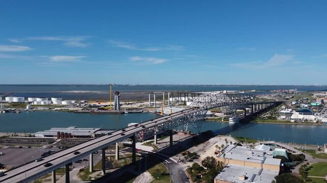 Corpus Christi Bridge Construction With Background Windmills Aerial Drone Footage 