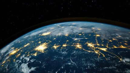 Obraz premium A view of Earth from space, showcasing illuminated cities and natural features.