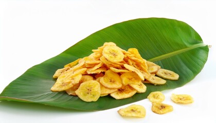 Crispy banana chips on a leaf.