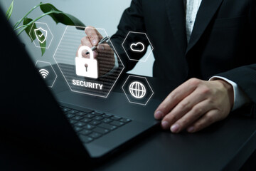 Business Person Using Computer with Connectivity and Security Icons