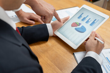Business men calculate benefit, spreadsheets, graph financial development, bank accounts,...