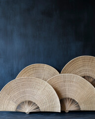 Earthy Rattan Fans Against a Deep Indigo Backdrop