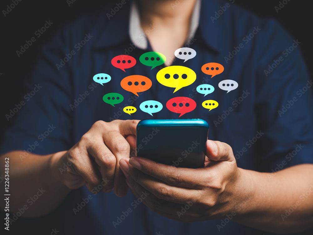 Poster close-up of hands using a smartphone with colorful chat bubbles symbolizing social media and messagi