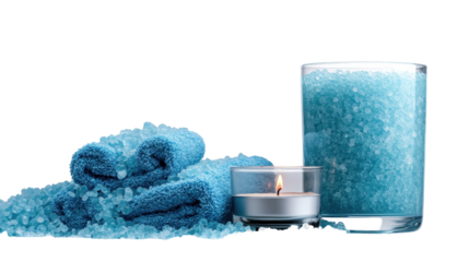 Spa Day Essentials:  A serene arrangement of blue bath salts, fluffy towels, and a flickering candle invites relaxation and self-care.