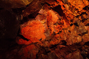Iceland’s Lava Tunnel, a stunning volcanic cave with rugged rock formations, vivid mineral colors, and ancient lava flows. A breathtaking glimpse into Iceland’s geological history.