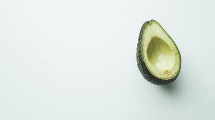 Halved Avocado on White Background: A Minimalist Food Photography