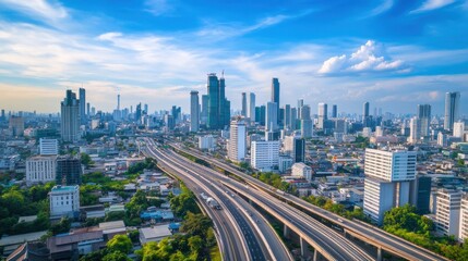 Elevated highway cutting through a densely built city with skyscrapers on a bright day