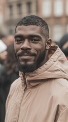 Fototapeta premium Confident African American Man in City Smiling Portrait