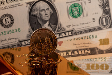 $1 coin and 999 gold bar