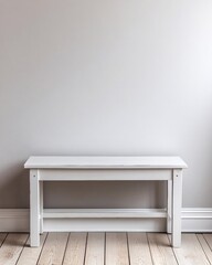 Fototapeta premium White wooden bench against a plain gray wall with light wooden floor in a minimalist setting