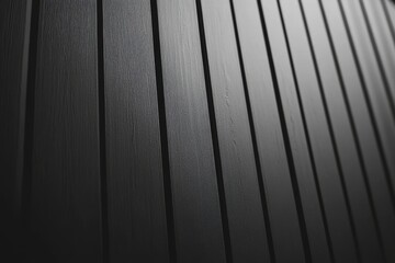 Textured Black Wooden Wall Panels with Vertical Lines and Shadows