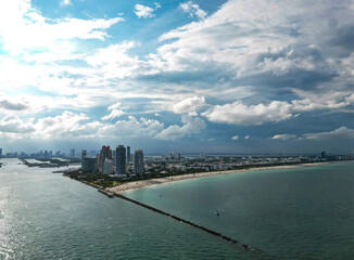 Obraz premium Drone view of The skyline of Miami. Miami Beach aerial view. South Beach, Miami Beach. Aerial view South Pointe Park in Miami Beach, Florida. American tourism in Florida.