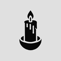 Obraz premium Candle silhouette in black on a white background