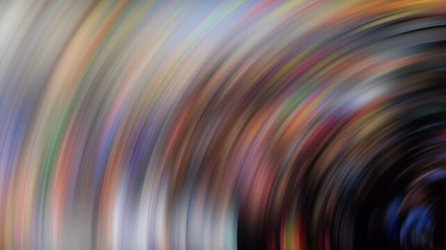 Abstract swirling motion background featuring vibrant radial blur and soft gradient tones, perfect for creative projects, video overlays, or artistic multimedia design trends in 2025.
