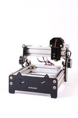 Mini Laser Engraving Machine for Wood on White Background. engraving handmade wood products and gift boxes.