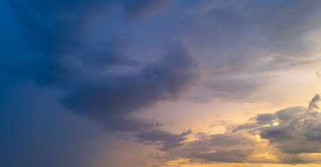 Sunset Clouds background. Dramatic Clouds Sunset Background. Sky with clouds in Sunrise. Sunrise with clouds in various shapes background. Calm Cloud.