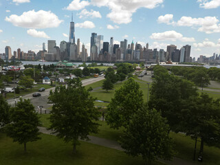 Fototapeta premium NYC aerial view. New York City skyline. Park and cityscape of Manhattan in USA. New York City NYC Manhattan Downtown Skyline, from Jersey City USA.