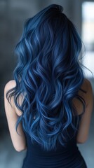 Naklejka premium Long wavy blue hair cascading down the back