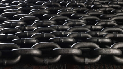 Obraz premium Heavy iron chain. Several iron chains laid out evenly.