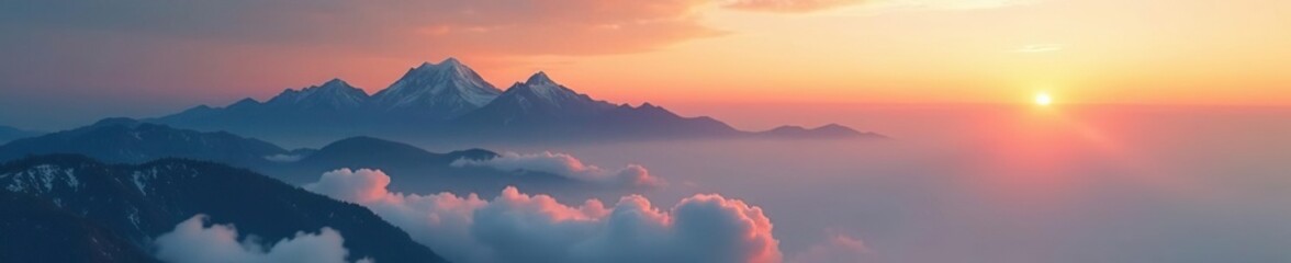 Softly swirling clouds float above mountain peaks at golden hour, sunset, soft focus