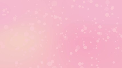 A soft pink bokeh background with a dreamy and elegant blur effect. The gentle pastel tones and glowing particles create a romantic and festive atmosphere.