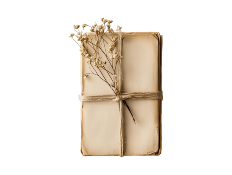 vintage notebook tied with rope and dried flowers on a transparent background