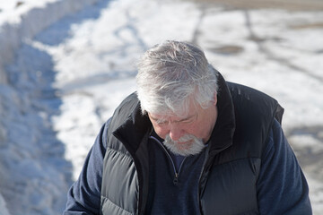 62 year old man outdoors while on vacation in Colorado.