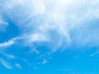 Beautiful clouds during spring time in a Sunny day. Blue sky and white fluffy clouds