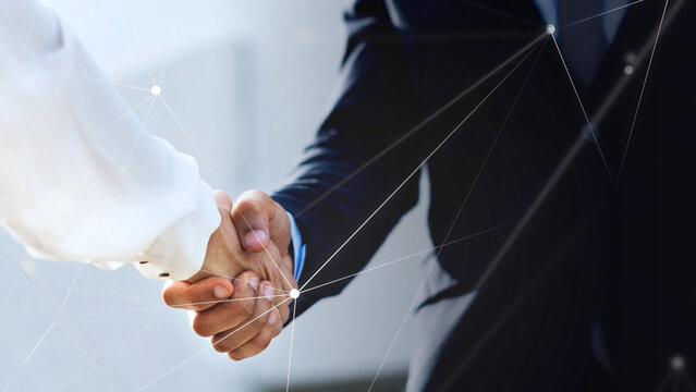 Business people shaking hands for an agreement