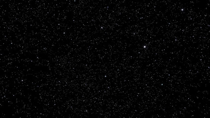 The dark night sky is studded with sparkling stars