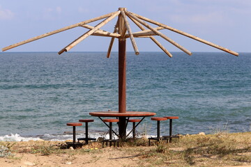 sunshade in city park on the seashore
