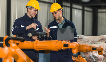 Robotic engineer oversee software, machine tool performance, enhance program for efficiency