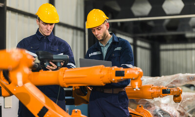 Robotic engineer oversee software, machine tool performance, enhance program for efficiency