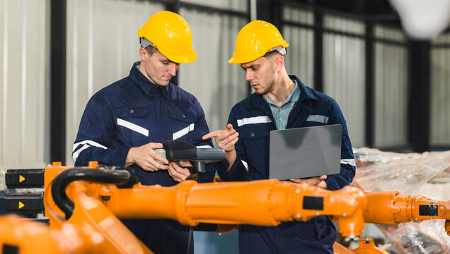 Robotic engineer oversee software, machine tool performance, enhance program for efficiency