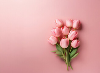 A delicate bouquet of pale pink tulips rests on a soft pink background.  The image evokes feelings of spring, romance, and serenity.