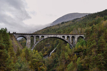 Stone Railway Bridge in Verdant Mountain Valley